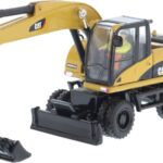 CATERPILLAR M318D Pelle sur pneus