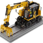 CATERPILLAR M323F Pelle ferovière, jaune securité