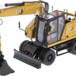 CAT M318 Pelle sur pneus