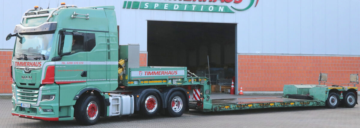 WSI01-5297-RESA MAN TGX GX 6x2 avec remorque porte-engins 2 essieux – Image 1